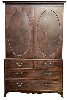 Lot 3007 - A George III mahogany linen press, the upper...