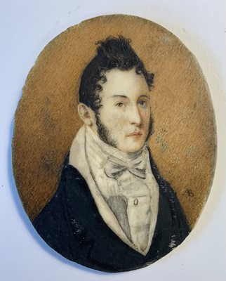 Lot 140 - Portrait miniatures An early 19th century...