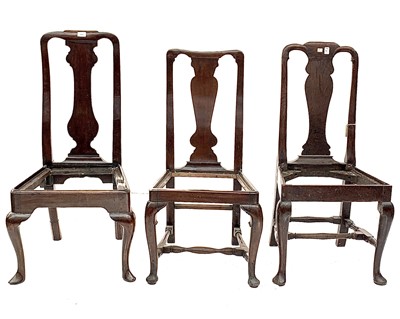 Lot 3047 - A Queen Anne walnut dining chair raised on...