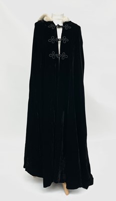 Lot 2848 - A 20th century ladies black velvet opera cape,...