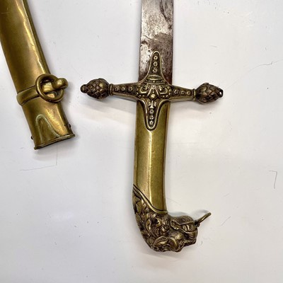 Lot 104 - A Victorian brass sword, with 69cm single...