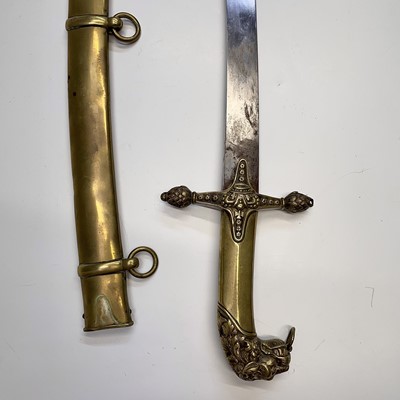 Lot 104 - A Victorian brass sword, with 69cm single...