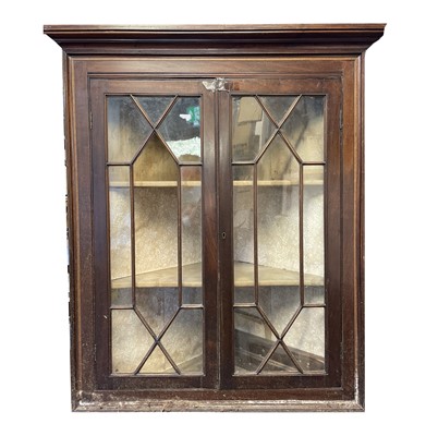 Lot 3074 - A George III mahogany hanging corner cupboard...