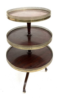 Lot 3075 - A Regency mahogany and brass three-tier...