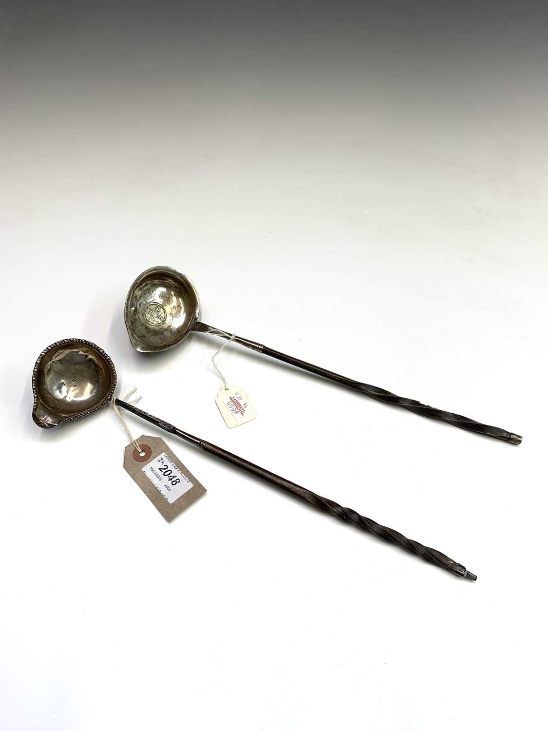Lot 87 - A George III punch ladle, 1772, with spiral...