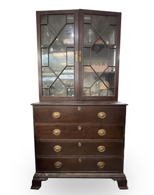 Lot 3084 - A George III mahogany secretaire bookcase, the...