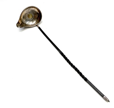 Lot 89 - A George III punch ladle set with a 1808 gold...