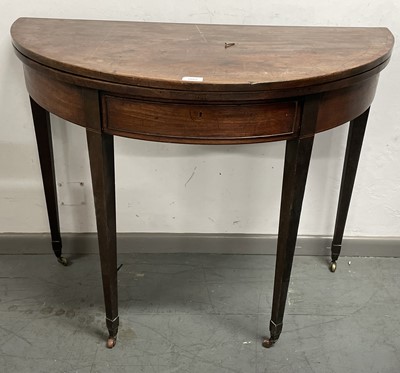 Lot 3085 - A George III mahogany half-round fold-top tea...