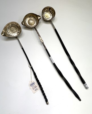 Lot 71 - Three coin set 18th century punch ladles, with...