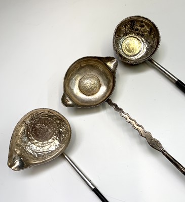 Lot 71 - Three coin set 18th century punch ladles, with...