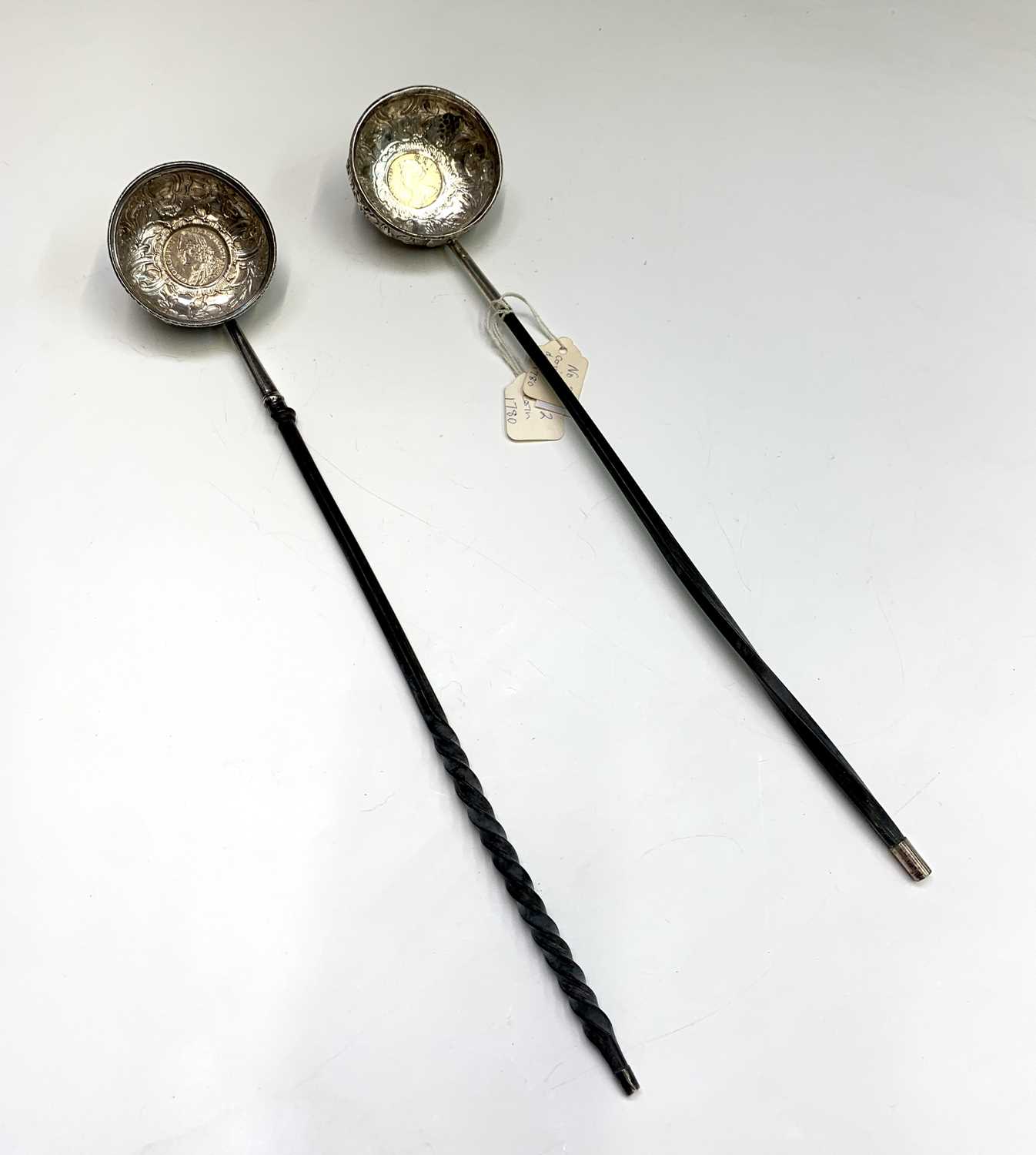 Lot 75 - Two silver punch ladles with whale bone...