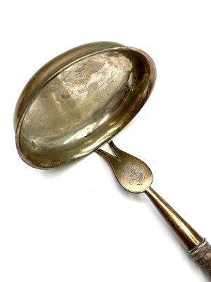 Lot 78 - An unusal provincial or colonial punch ladle,...