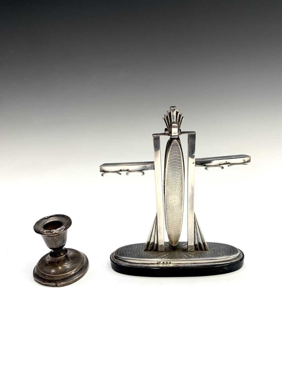 Lot 92 - An Art Deco silver manicure stand with engine...
