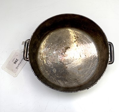 Lot 94 - A hammered silver circular bowl by George...