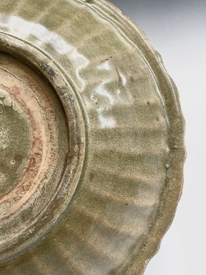 Lot 4 - A Chinese Longquan celadon dish, Ming Dynasty,...