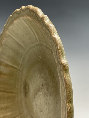 Lot 4 - A Chinese Longquan celadon dish, Ming Dynasty,...