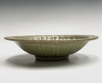 Lot 5 - A Chinese Longquan celadon dish, Ming Dynasty,...