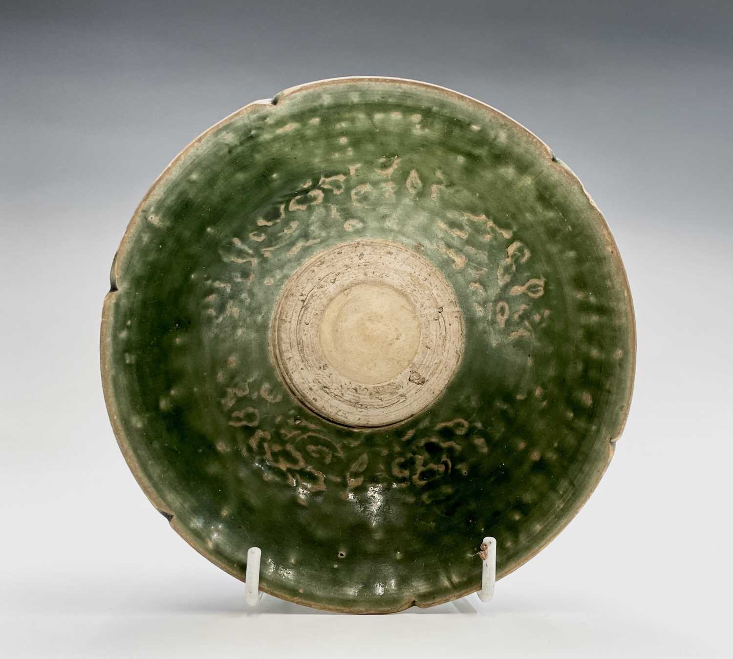 Lot 12 - A Chinese celadon bowl, Ming Dynasty, the...