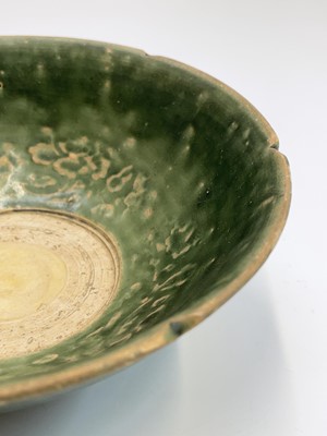 Lot 12 - A Chinese celadon bowl, Ming Dynasty, the...
