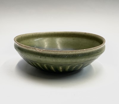 Lot 14 - A Chinese celadon bowl, Ming Dynasty, the...