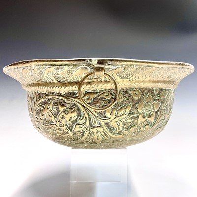 Lot 223 - A Victorian embossed brass bowl, decorated...