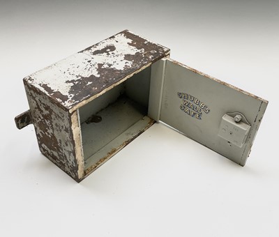 Lot 44 - A Chubb's steel wall safe, open but the key is...
