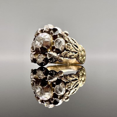 Lot 188 - A Georgian gold ring with a rose-cut diamond...