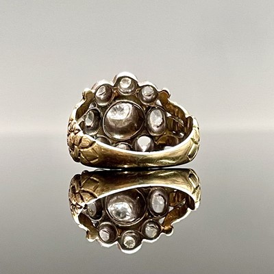 Lot 188 - A Georgian gold ring with a rose-cut diamond...