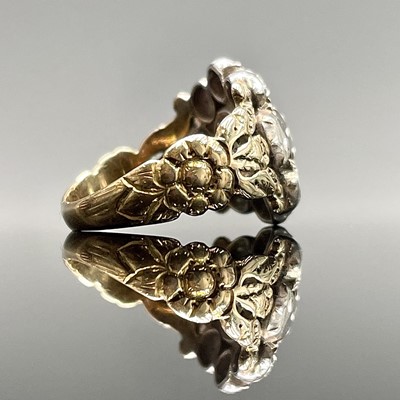 Lot 188 - A Georgian gold ring with a rose-cut diamond...