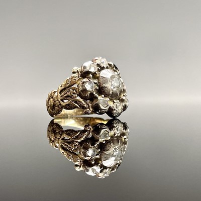 Lot 188 - A Georgian gold ring with a rose-cut diamond...