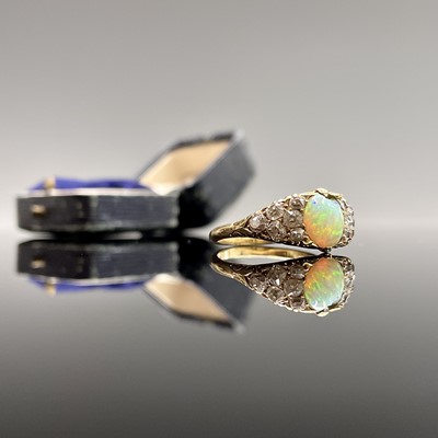 Lot 210 - A Victorian yellow gold opal and diamond ring...