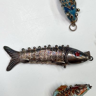 Lot 227 - Five Chinese articulated fish. The largest...