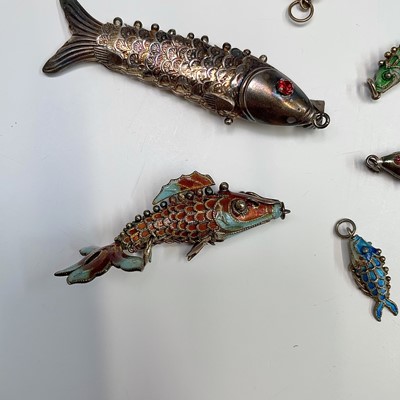 Lot 227 - Five Chinese articulated fish. The largest...