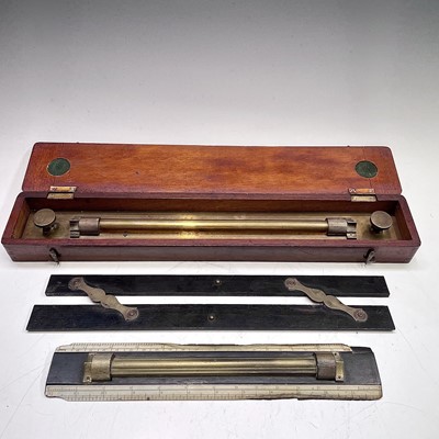 Lot 406 - A brass rolling rule, stamped UWW Makers...