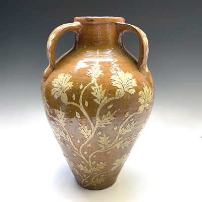 Lot 140 - A large slipware two-handled vase, circa...