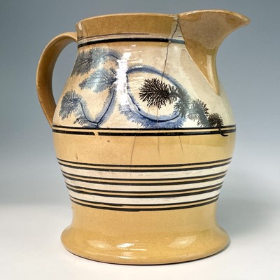 Lot 257 - A large Mocha ware jug, late 19th century,...