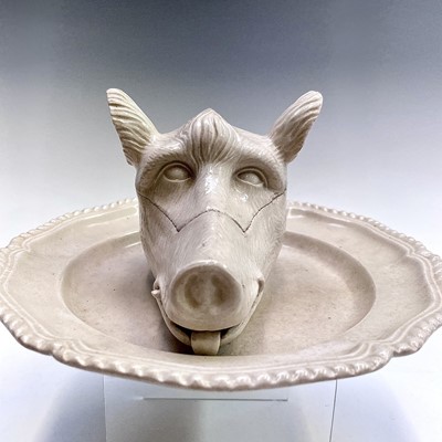 Lot 878 - A porcelain tureen and cover in the form of a...