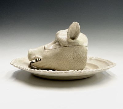 Lot 878 - A porcelain tureen and cover in the form of a...