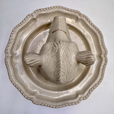 Lot 878 - A porcelain tureen and cover in the form of a...