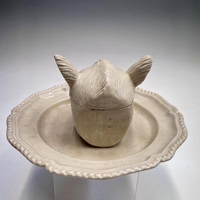 Lot 878 - A porcelain tureen and cover in the form of a...