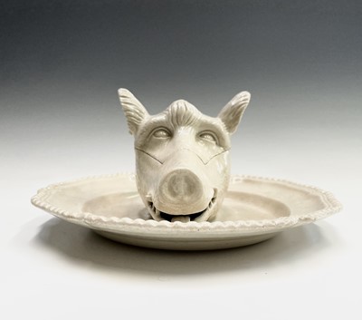 Lot 878 - A porcelain tureen and cover in the form of a...
