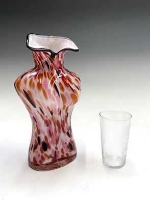 Lot 857 - An art glass vase in the form of a female...