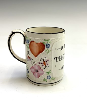 Lot 806 - A good Swansea creamware mug, press moulded...