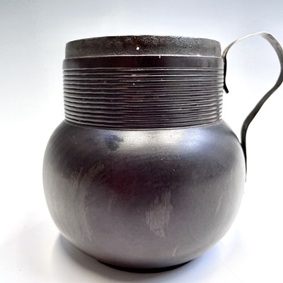 Lot 24 - An early 18th century turned lignum vitae mug,...