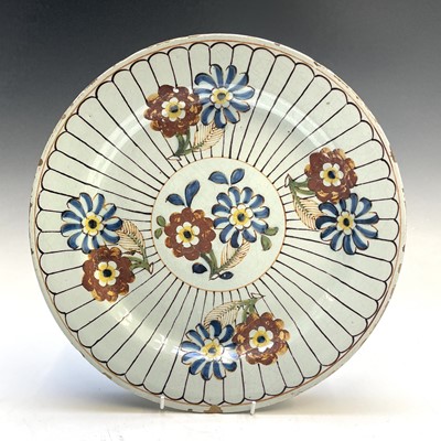 Lot 4 - An 18th century floral decorated polychrome...