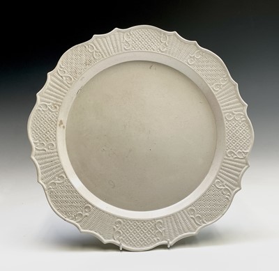 Lot 877 - A Staffordshire salt-glazed charger, circa...