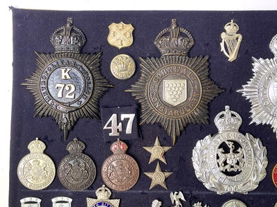 Lot 269 - British Police Force Badges. A display card of...