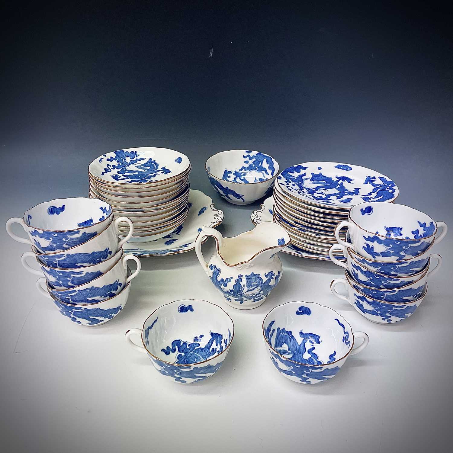 Lot 848 - A Coalport 'Blue Dragon' pattern tea service...