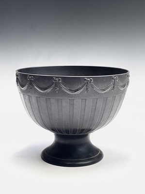 Lot 867 - A Wedgwood black basalt pedestal bowl, 20th...