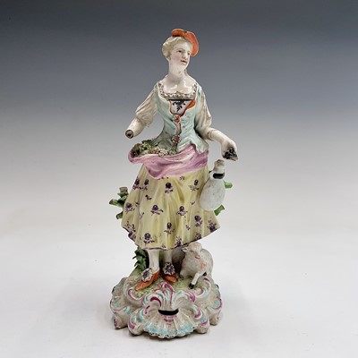 Lot 868 - A Derby figure of a shepherdess, 18th century,...